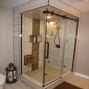 Corner shower with fold up bench