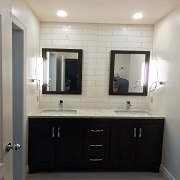 Vanity with tiled back wall