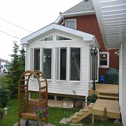 Sunroom with small deck
