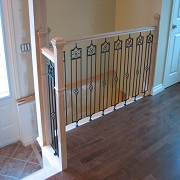 Wood railing with metal balusters