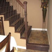 Tiled stairs with contrasting wood bullnose