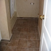 Tiled floor and tile baseboards